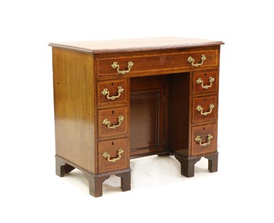 Lot 539 - A George III style mahogany, strung and crossbanded kneehole desk