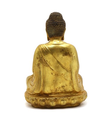 Lot 76 - A Sino-Tibetan bronze Buddha