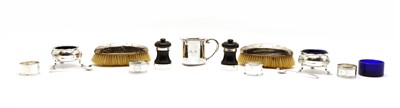 Lot 54 - Two open salts and two ebonised pepper grinders