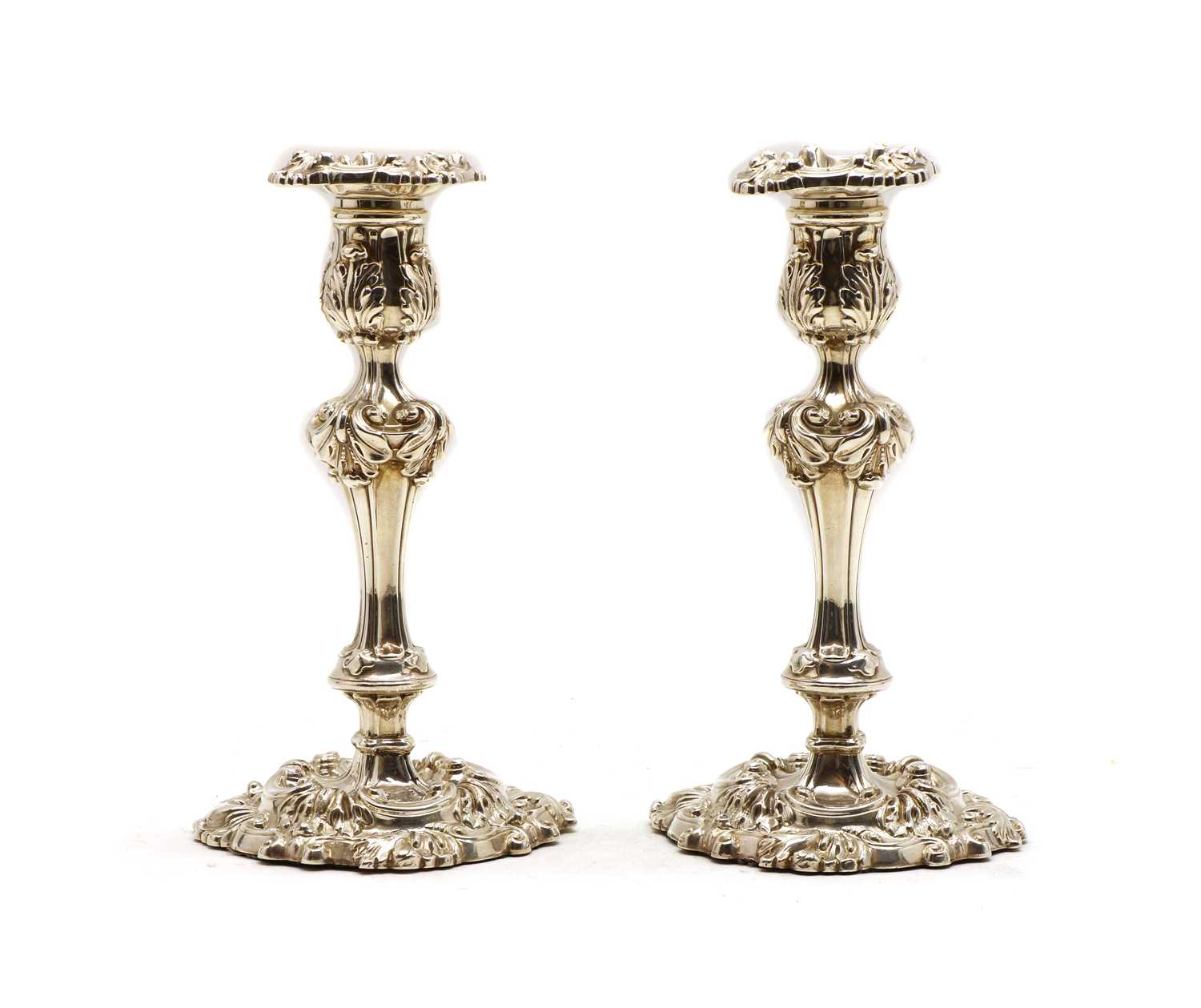 Lot 30 - A pair of George III silver candlesticks