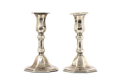 Lot 193 - A pair of silver candlesticks