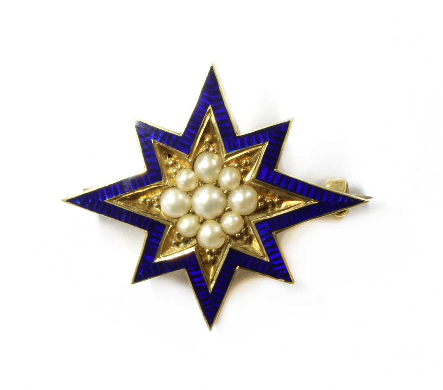 Lot 1014 - A Victorian gold split pearl and enamel star