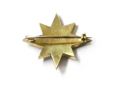 Lot 1014 - A Victorian gold split pearl and enamel star
