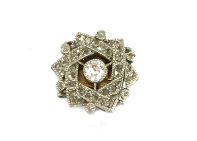 Lot 1064 - A diamond set star clasp