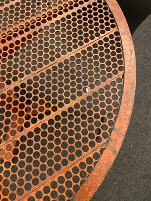 Lot 671 - A red painted and perforated metal garden table