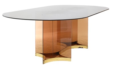 Lot 651 - An Italian smoked glass and brass dining table
