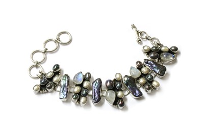 Lot 1271 - A silver cultured freshwater pearl, blister pearl and moonstone bracelet