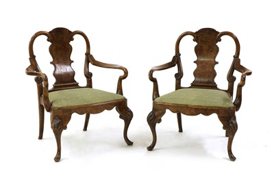 Lot 496 - A pair of George II style walnut armchairs