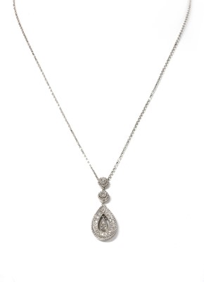 Lot 1125 - A white gold diamond pendant