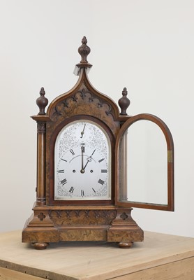 Lot 790 - A Victorian Gothic walnut table clock