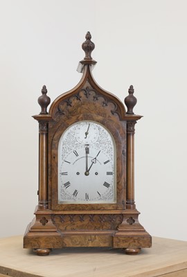 Lot 790 - A Victorian Gothic walnut table clock