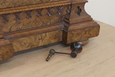 Lot 790 - A Victorian Gothic walnut table clock
