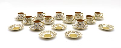 Lot 301 - A collection of Limoges coffee cups and saucers