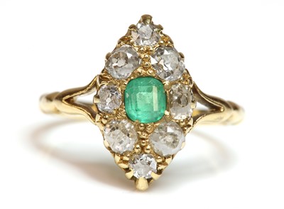 Lot 94 - A late Victorian emerald and diamond marquise shaped cluster ring, by Alabaster & Wilson, c.1900
