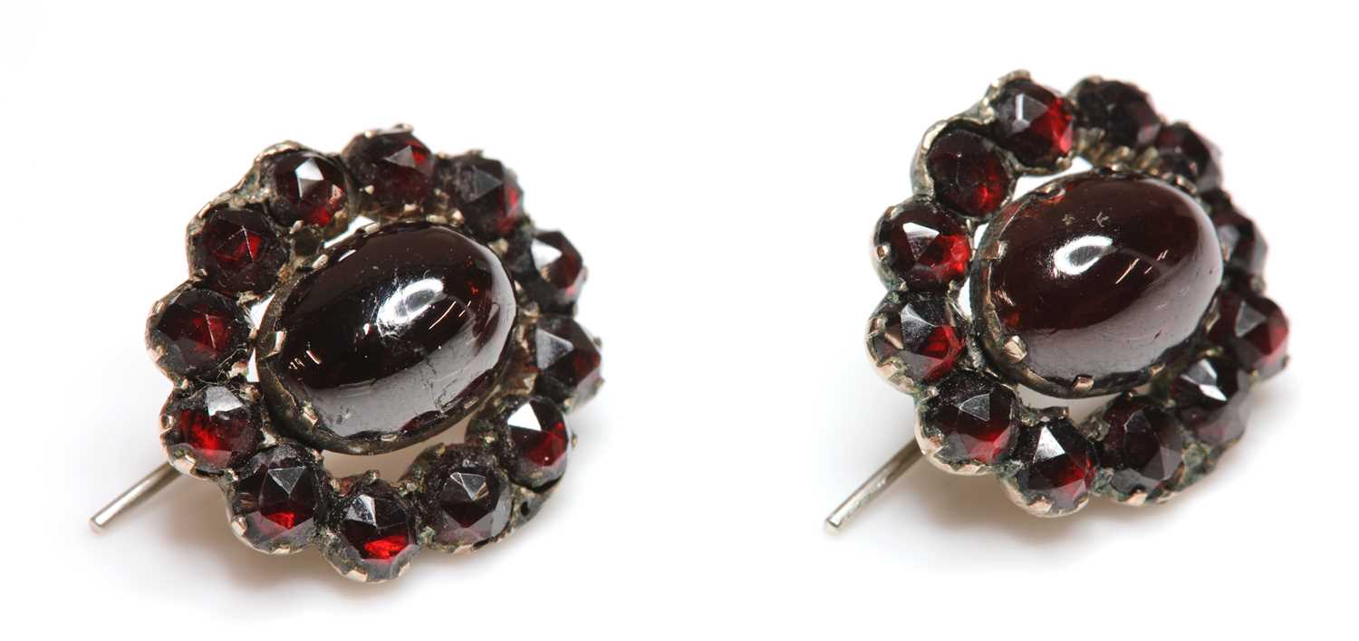 Lot 10 - A pair of Victorian bohemian garnet oval cluster earrings