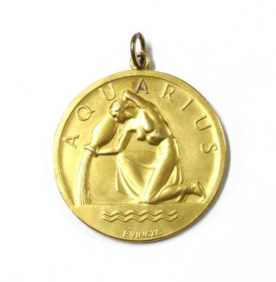 Lot 1333 - A 9ct gold zodiac Aquarius medallion, by Paul Vincze