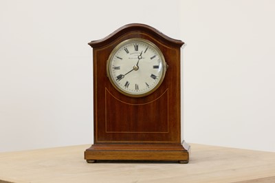 Lot 613 - An Edwardian Eureka electric mantel clock