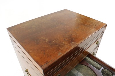 Lot 419 - A mahogany campaign dressing chest