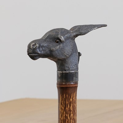 Lot 110 - A silver 'spitting' donkey's head automaton walking stick