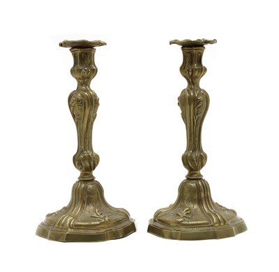 Lot 115 - A pair of gilt bronze candlesticks