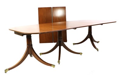 Lot 410 - A Regency style mahogany three-pillar dining table