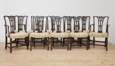 Lot 251 - A set of ten Chippendale-style mahogany dining chairs