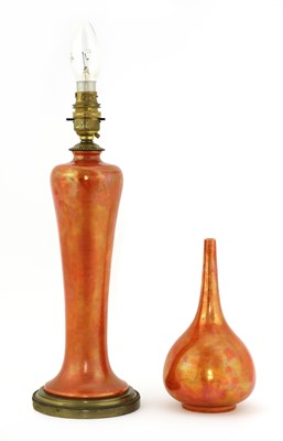 Lot 172 - A Ruskin Pottery orange lustre table lamp
