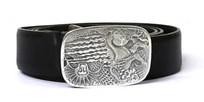 Lot 1347 - A sterling silver engraved 'River Horse' belt buckle, by Malcolm Appleby