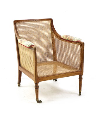 Lot 480A - A late 19th century walnut bergere chair