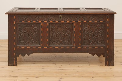 Lot 608 - An oak coffer