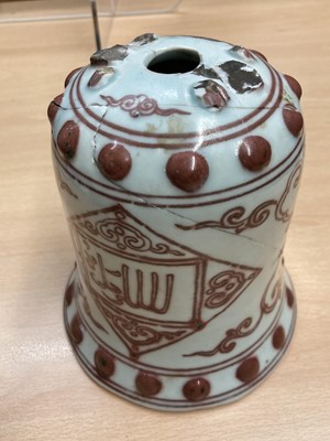 Lot 120 - A Chinese copper red porcelain bell