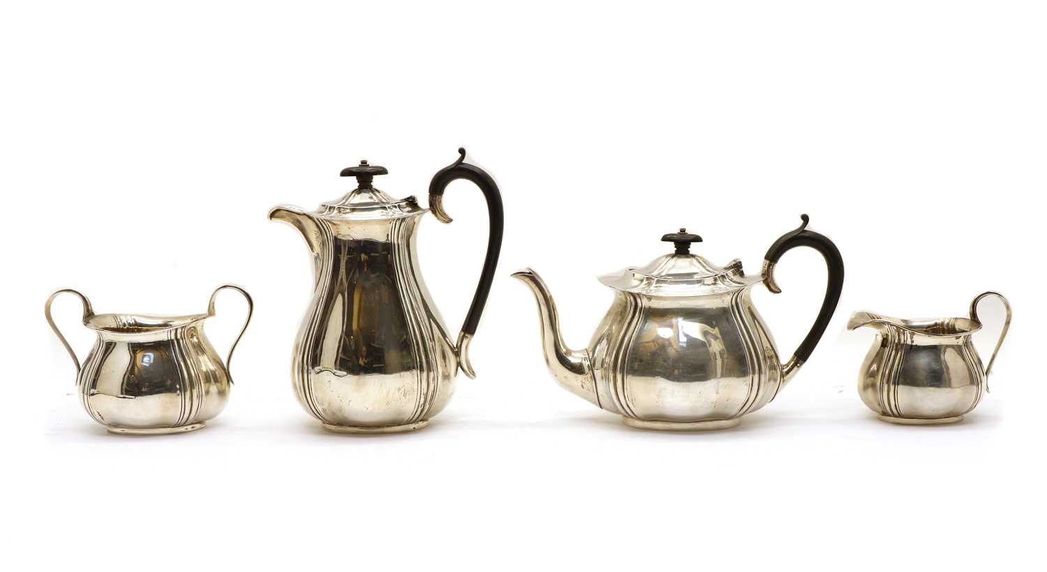 Lot 65 - A silver four-piece tea set by James Deakin & Sons