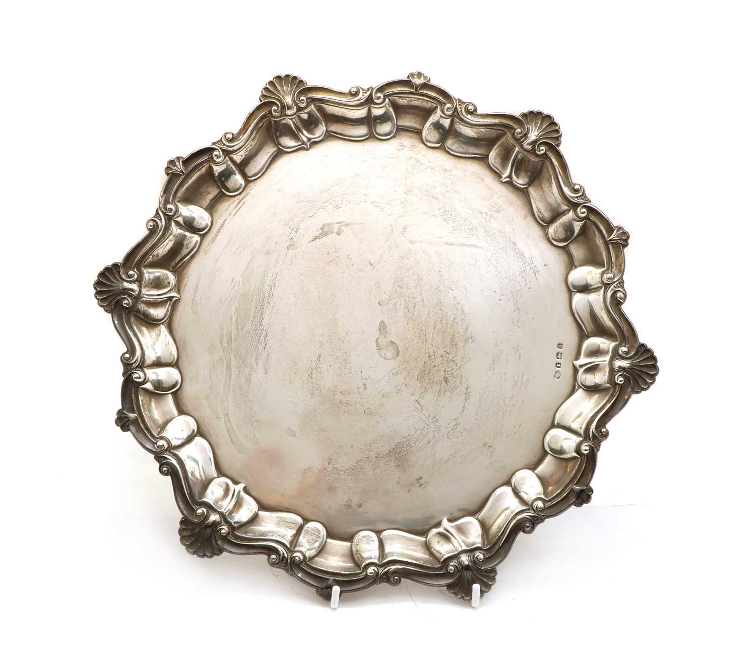 Lot 68 - A silver salver of circular form by Alexander Clark & Co