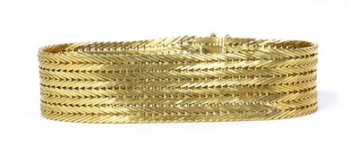 Lot 344 - An 18ct gold bracelet, c.1960