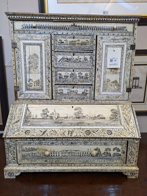 Lot 25 - An Anglo-Indian sandalwood and ivory miniature bureau cabinet