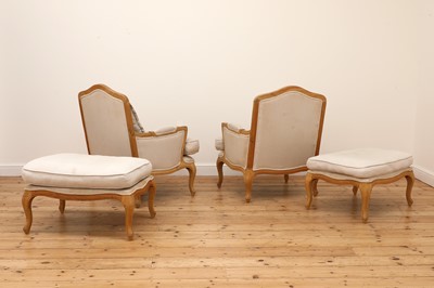 Lot 490 - A pair of blonde oak fauteuils