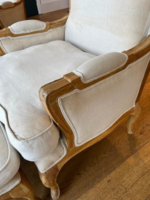 Lot 490 - A pair of blonde oak fauteuils