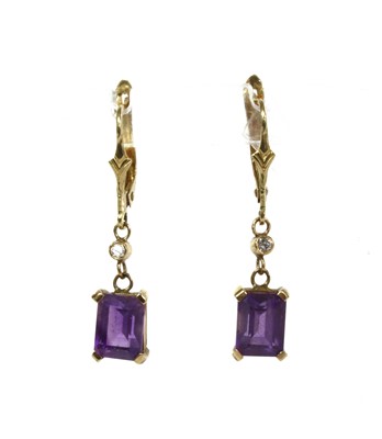 Lot 307 - A pair of gold amethyst and diamond drop earrings