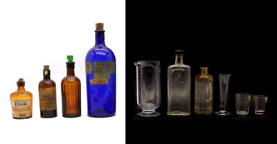 Lot 267 - A collection of glass apothecary bottles