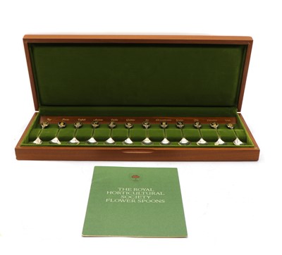 Lot 30 - A cased set of twelve silver Royal Horticultural Society flower spoons