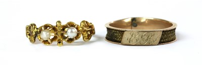 Lot 6 - A Victorian gold two stone split pearl ring