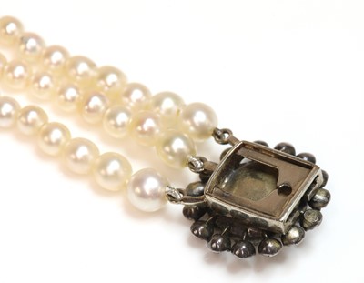 Lot 151 - A three row pearl bracelet