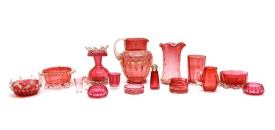 Lot 252 - A collection of Victorian and later cranberry glass to include a water jug
