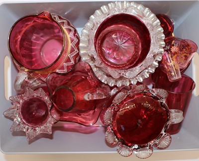 Lot 252 - A collection of Victorian and later cranberry glass to include a water jug