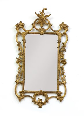 Lot 491 - An Italian curved giltwood wall mirror