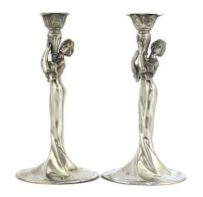 Lot 102 - Two WMF silvered figural candlesticks