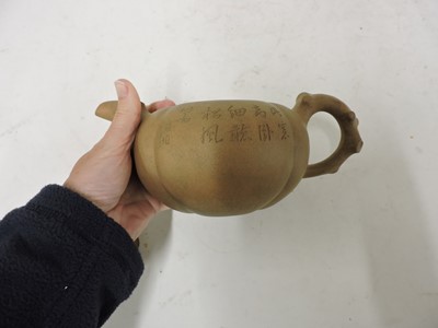Lot 143 - A Chinese Yixing zisha teapot and cover