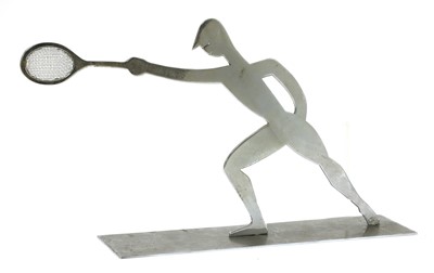 Lot 329 - A Hagenauer silvered fret-cut figure of a tennis player