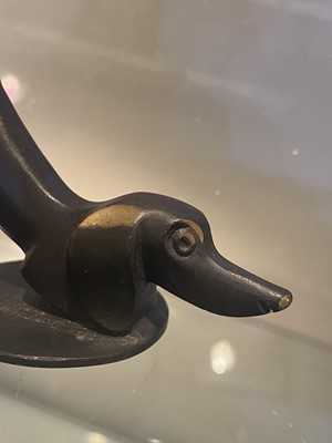 Lot 332 - A Hagenauer patinated bronze dachshund
