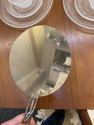 Lot 335 - A Hagenauer silvered hand mirror